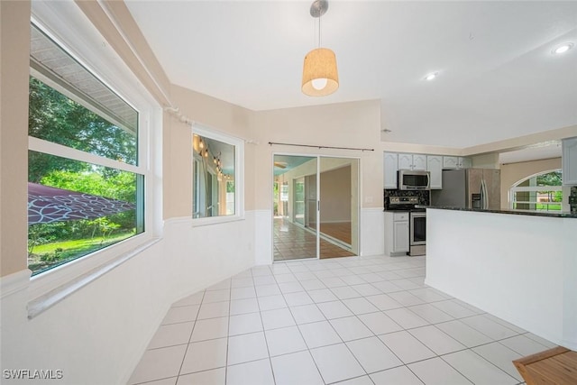 interior space with light tile patterned flooring