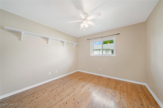 spare room with ceiling fan and light hardwood / wood-style flooring