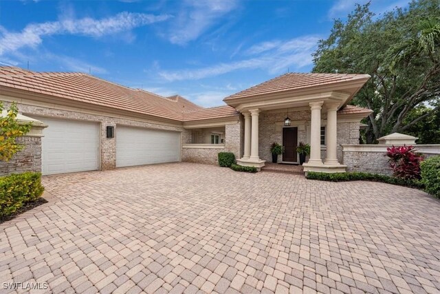 view of front of house with a garage