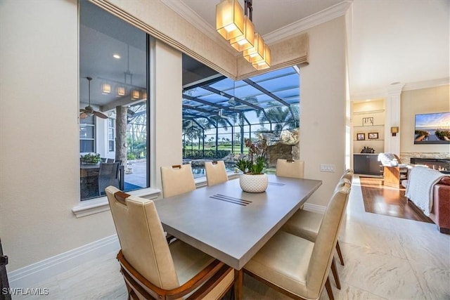 dining room featuring crown molding