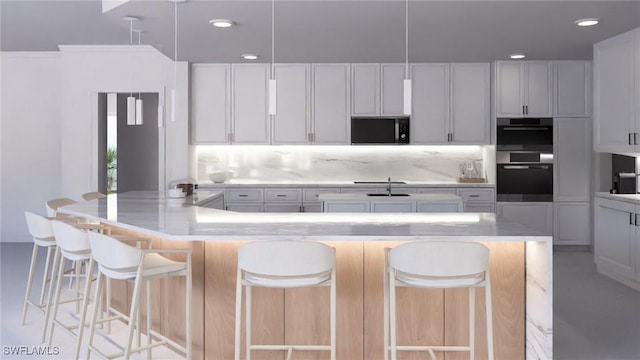 kitchen with a spacious island, backsplash, a kitchen bar, and white cabinetry