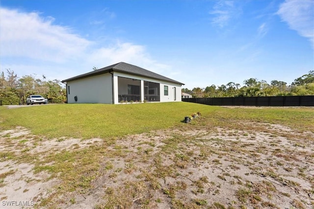 exterior space featuring a sunroom