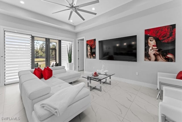 living room featuring french doors and ceiling fan