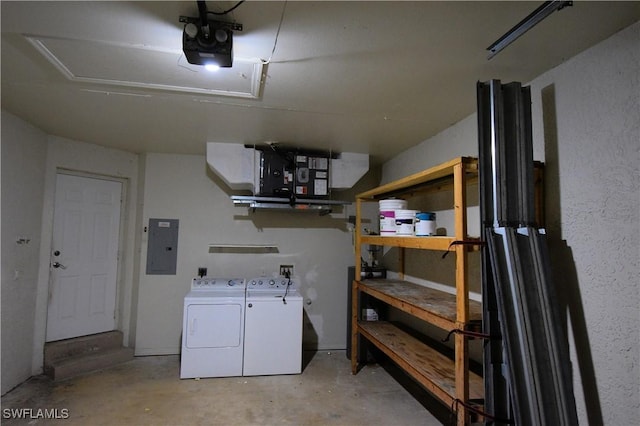 interior space featuring a garage door opener, washer and dryer, and electric panel