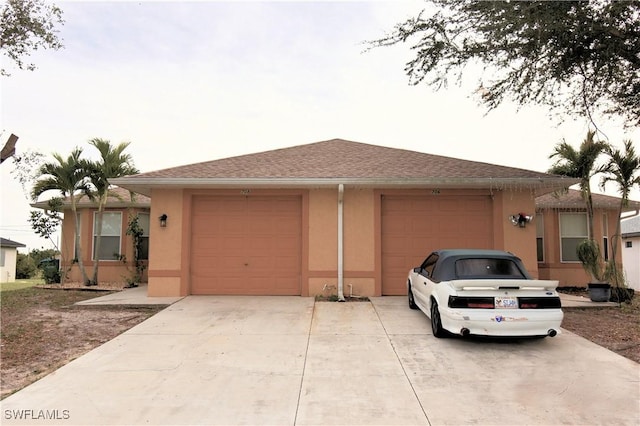 single story home with a garage