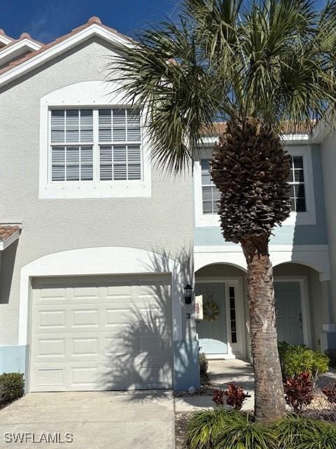 view of front of property with a garage