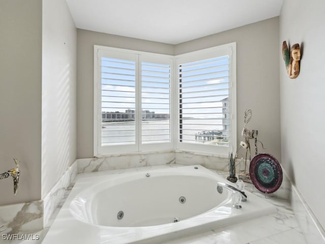 bathroom with a tub