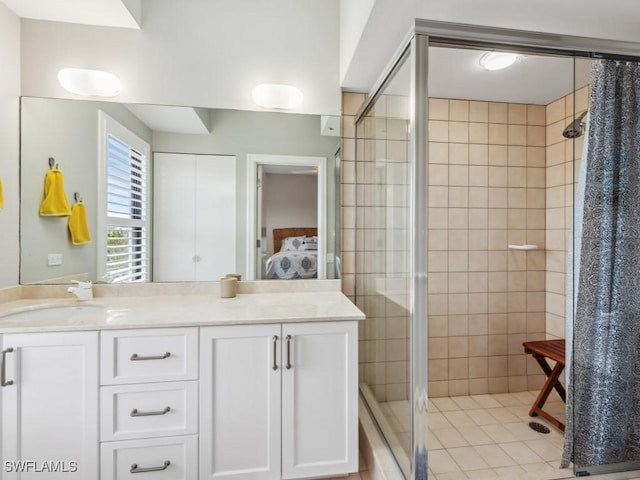 bathroom with vanity and an enclosed shower