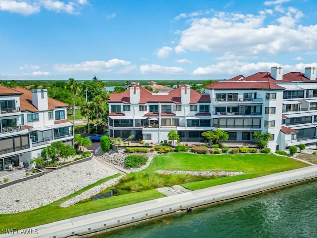 drone / aerial view featuring a water view