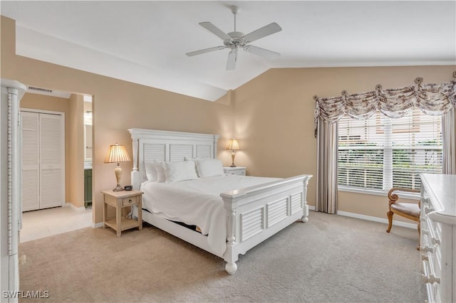 carpeted bedroom featuring ceiling fan and lofted ceiling