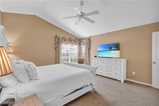 carpeted bedroom featuring ceiling fan and lofted ceiling