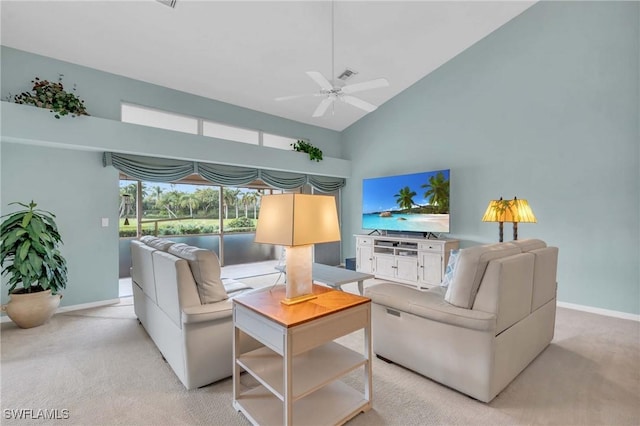 carpeted living room featuring high vaulted ceiling and ceiling fan