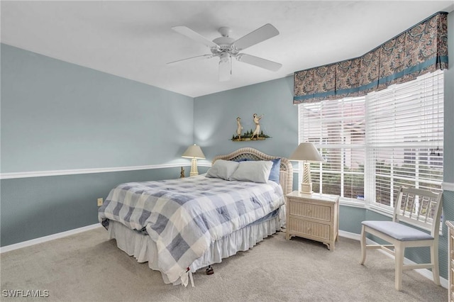 bedroom featuring ceiling fan and carpet floors