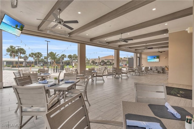 view of patio featuring ceiling fan