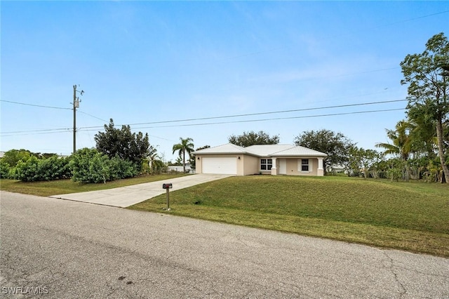 ranch-style home with a front yard and a garage