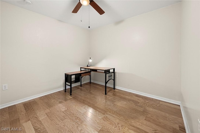 office area featuring light hardwood / wood-style floors and ceiling fan