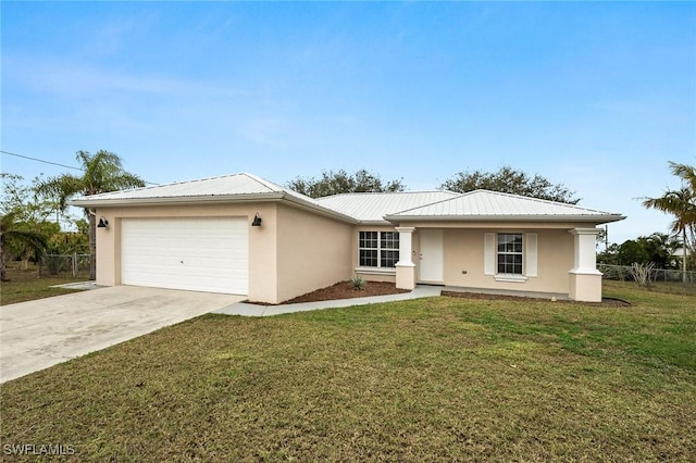 ranch-style house featuring a garage, covered porch, and a front lawn