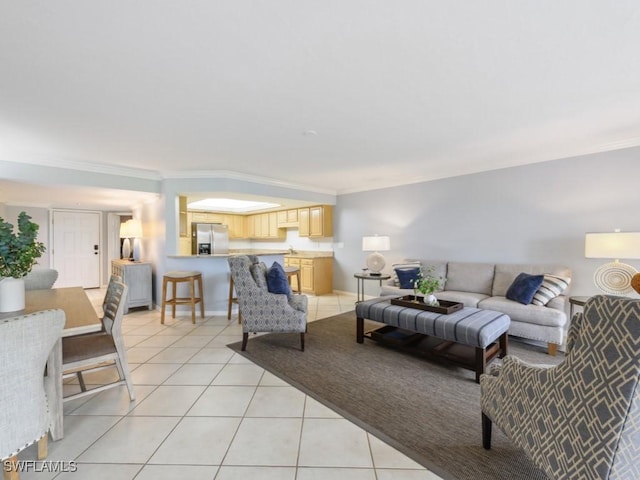 living room with crown molding and light tile patterned floors