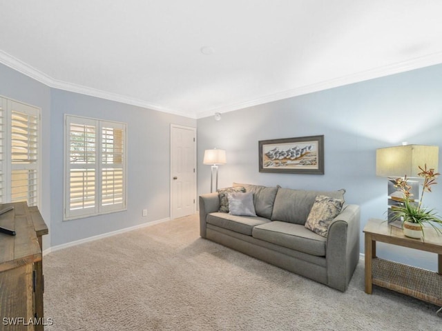 carpeted living room with ornamental molding