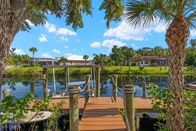 dock area with a water view