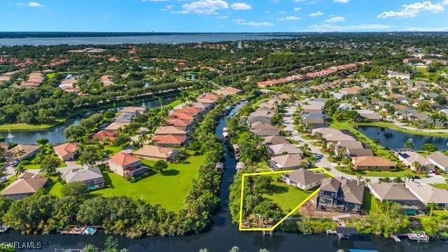 bird's eye view with a water view