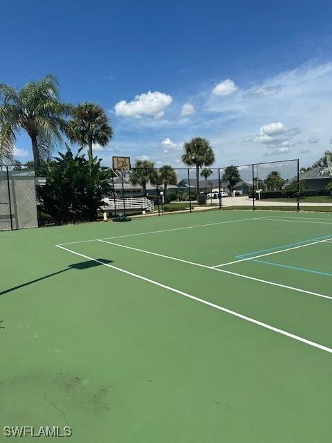 view of tennis court with basketball court