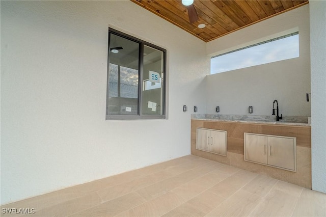 view of patio featuring sink and ceiling fan