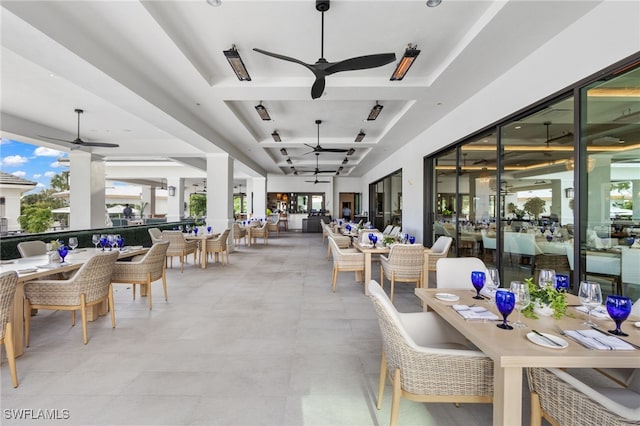 view of patio / terrace featuring ceiling fan and outdoor dining area