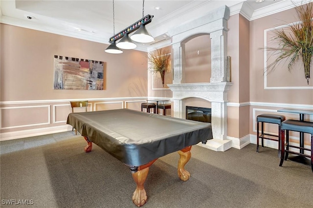 recreation room with a fireplace, ornamental molding, pool table, and carpet