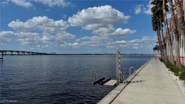 view of dock with a water view