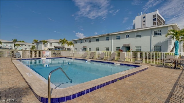 view of swimming pool featuring a patio area