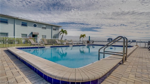 view of pool featuring a patio area