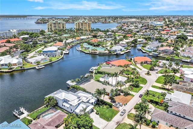 birds eye view of property featuring a water view