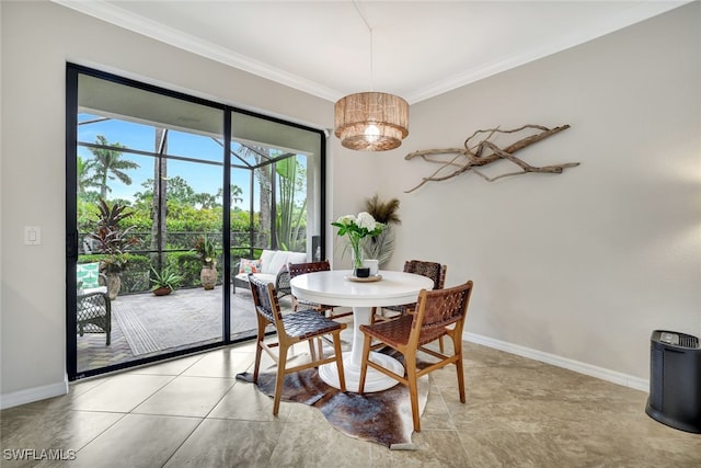 tiled dining space featuring ornamental molding