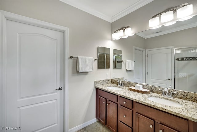 bathroom featuring a shower with door, crown molding, and vanity