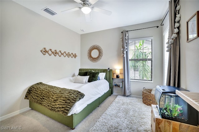 carpeted bedroom with ceiling fan