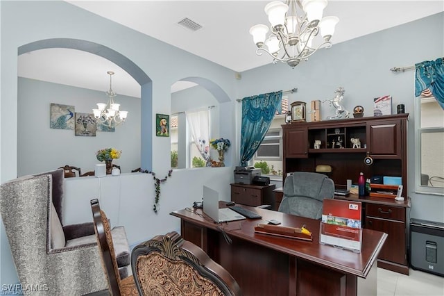 office featuring light tile patterned flooring and a chandelier