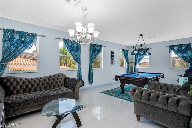 recreation room with an inviting chandelier and pool table