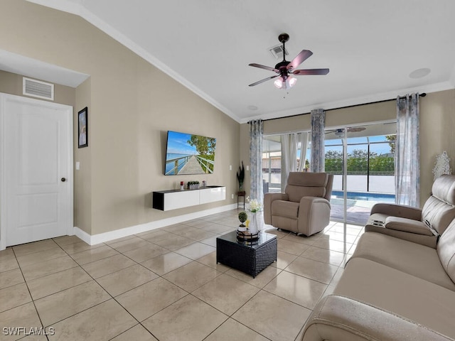 tiled living room featuring vaulted ceiling, ornamental molding, and ceiling fan