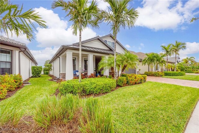 view of front of home with a front lawn