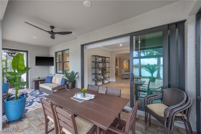 view of patio featuring ceiling fan and outdoor lounge area