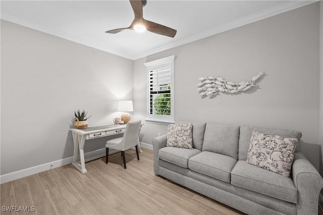 office area with crown molding, ceiling fan, and light hardwood / wood-style floors