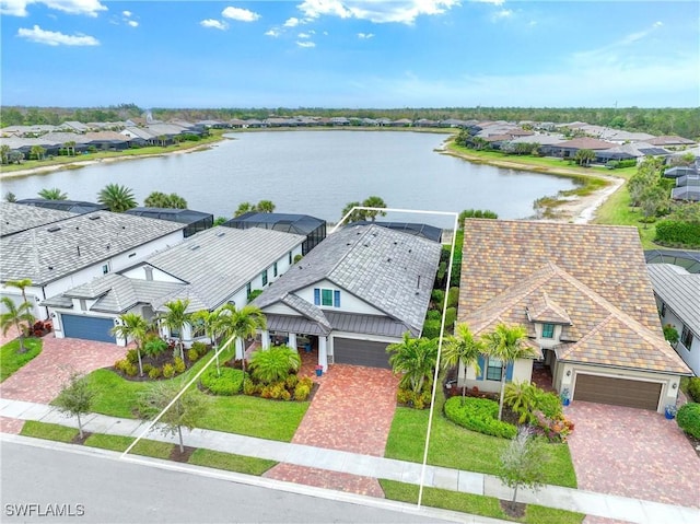 aerial view featuring a water view