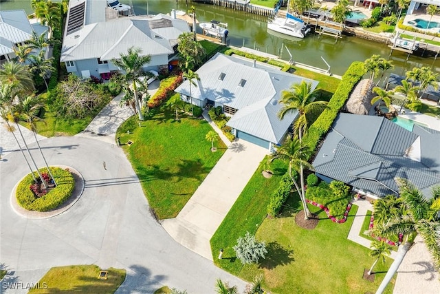 bird's eye view with a water view