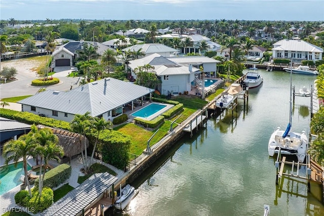 bird's eye view with a water view