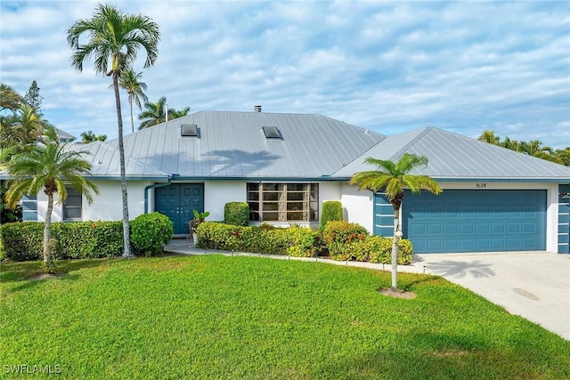 ranch-style home featuring a garage and a front lawn