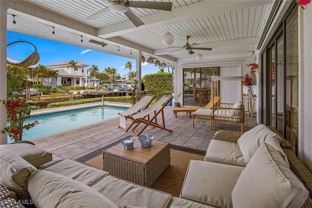 view of patio / terrace with ceiling fan and an outdoor hangout area