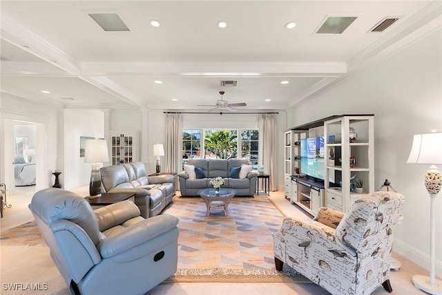 living room featuring beamed ceiling, ceiling fan, and ornamental molding