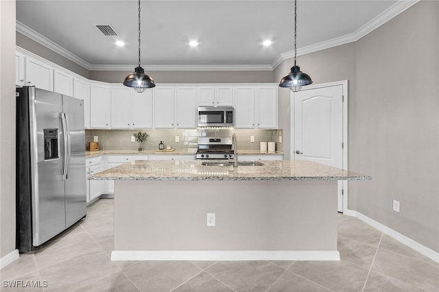 kitchen featuring white cabinetry, appliances with stainless steel finishes, and a center island with sink