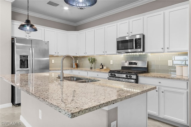 kitchen featuring sink, white cabinetry, and appliances with stainless steel finishes